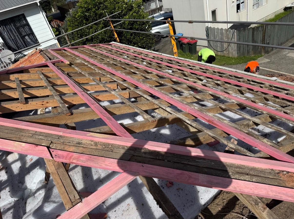 A roof stripped to new battens, the stage at which ceiling insulation goes in from above